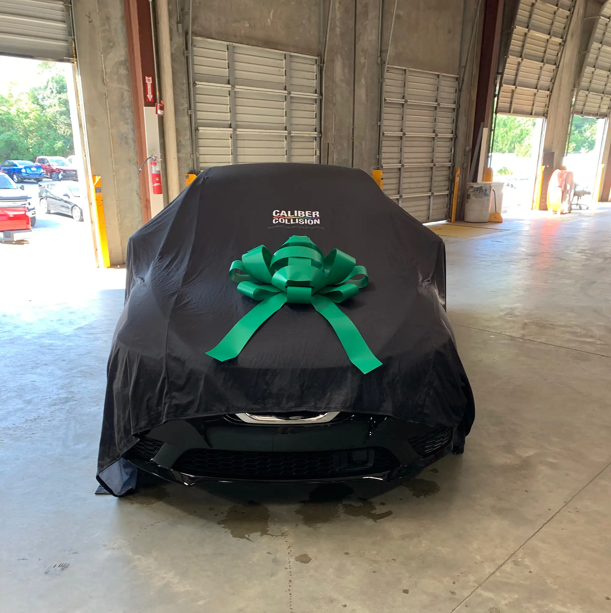 Ready for the unveiling at an NABC Recycled Rides giveaway event.